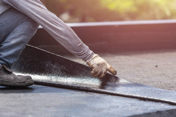 Professional Waterproofing technician working in Raymond, WI